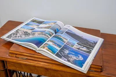 a magazine sitting on top of a wooden table at Central Athenian 1BR Apartment in Athens