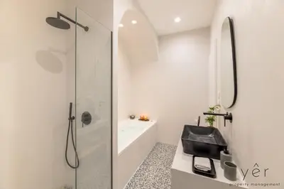 a bathroom with a shower and a sink at Luxury Home & Great Location in Athens