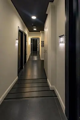 a corridor of a hallway with a long hallway at Triple A @ Trendy Psiri - Art & Nightlife in Athens