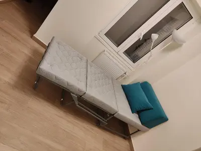 an overhead view of a couch in a living room at Litseli in Athens