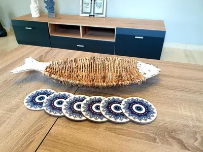 a group of plates sitting on a wooden floor at EcoStay-Scandy,2bdr cozy apartment by the sea in Alimos in Athens