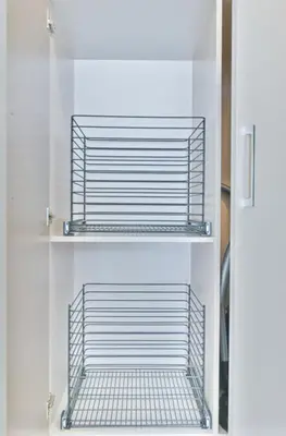 a refrigerator with two shelves in a room at Milano Lux in Athens