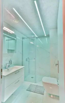 a bathroom with a shower and a toilet and a sink at Milano Lux in Athens