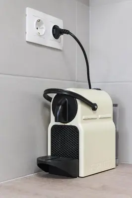 a black and white toaster with a light on it at Sweet & New Studio-Center Athens in Athens