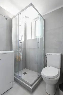 a bathroom with a shower and a toilet at Sweet & New Studio-Center Athens in Athens