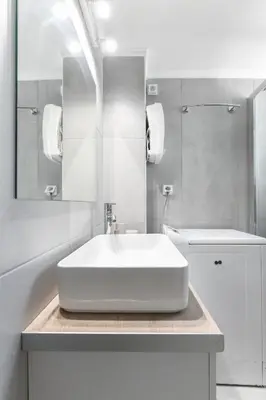 a white bathroom with a sink and a mirror at Sweet & New Studio-Center Athens in Athens