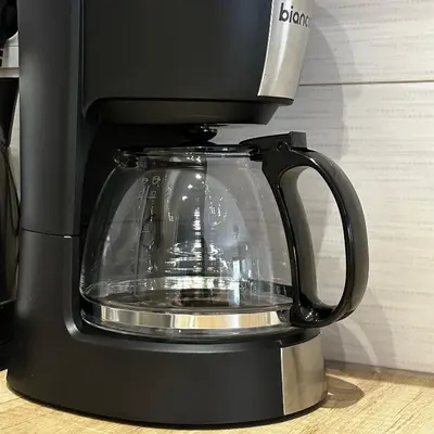 a black coffee maker with a glass pot at Dafni City Apartment 2 in Athens