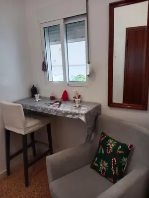 a living room with a table and a couch at Platinum Central Apartment in Athens