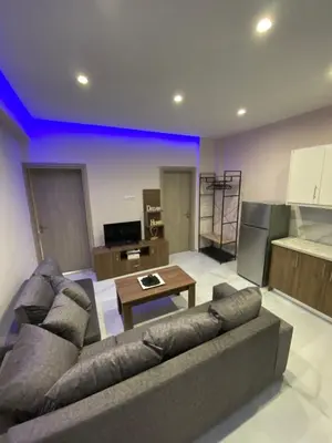 a living room with a couch and a table at Modern Rous Apartment in Athens in Athens