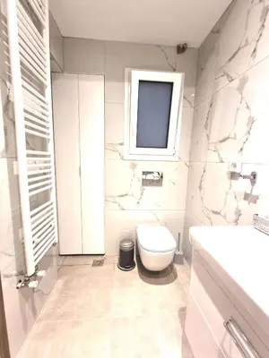 a bathroom with a toilet and a sink at Acropolis Oasis by YHA in Athens