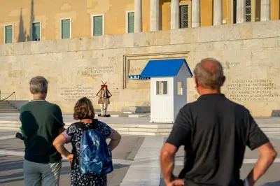 a group of people standing in front of a wall at Divine 2BR Apartment in the Heart of Athens in Athens