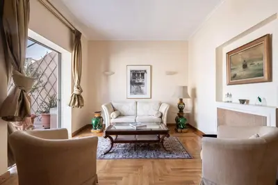 a living room with a couch and a coffee table at All time Classic: Pianist's 5th FL Apt @ Acropolis in Athens
