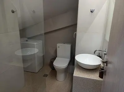 a bathroom with a toilet and a sink at Apartment Dipla in Athens