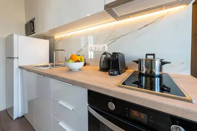 a kitchen with a sink and a counter top at Beautiful loft close to Acropolis in Athens