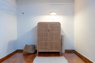 a room with a heater in the corner of a wall at Cream in Athens