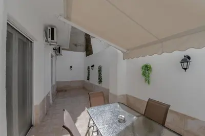 a dining room with a table and chairs at Marina Zeas Hidden Gem in Piraeus