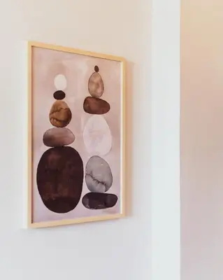 a framed painting of rocks on a wall at Vivid Stays Athens in Athens
