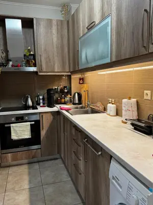a kitchen with a sink and a stove top oven at Hill View Apartment near Acropolis in Athens