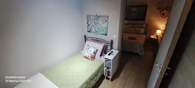 an overhead view of a small bedroom with a bed at Zoe garden home in Spáta