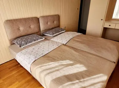a large bed with two pillows on top of it at Retro Panoramic Rooftop VIPGreece in Athens