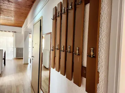 a hallway with a row of mirrors on the wall at Retro Panoramic Rooftop VIPGreece in Athens