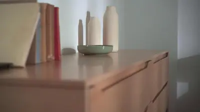 a wooden cabinet with a bowl on top of it at Modern Two-Bedroom Apartment In Kolonaki, Peridot - Homes in Athens