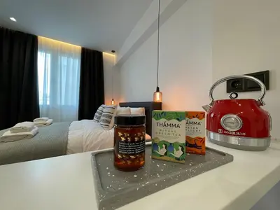 a kitchen counter with a toaster and a jar of food at Monastiraki 513 SuperHost Hub in Athens