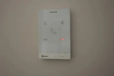 a white switch on a white wall at Agnes apartment Filopappou in Athens