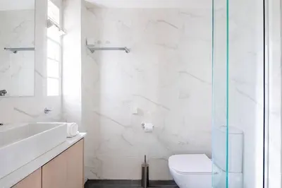 a bathroom with a toilet and a sink and a shower at Best spot apartment in Athens in Athens