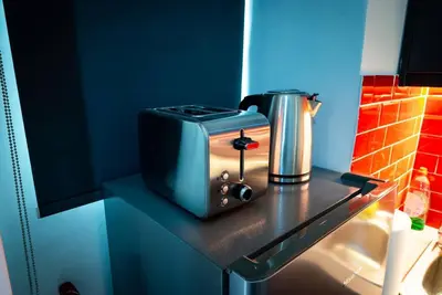 a toaster sitting on top of a counter at Studio Apartment next to Alsos Ilision in Athens