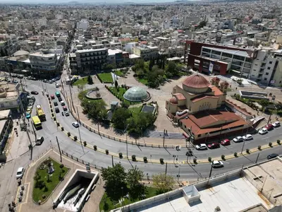 an aerial view of a city with a street at Athenian Sky View - next to Metro in Athens