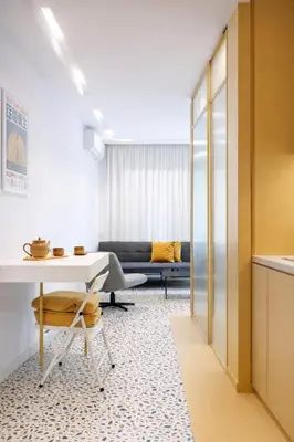 a living room with a table and a couch at Nueva era @ Athens heart , Romvis apartments in Athens