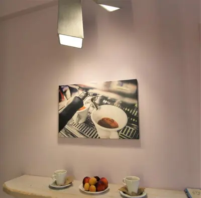 a picture of a bowl of food on a wall at Aiolos Apartments Ermou 64 Monastiraki Plaka Junior Suite in Athens