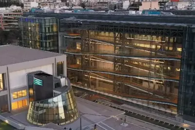 a view of a large building with a train station at Newly renovated-City Center Apartment in Athens