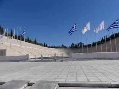 a large amphitheater with flags in the stands at Newly renovated-City Center Apartment in Athens