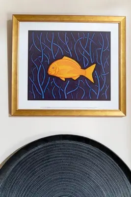 a picture of a gold fish on a wall at Alios, Luxury Living Athens in Athens