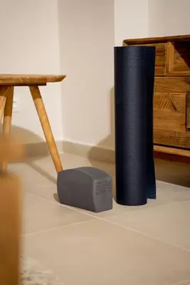 a speaker sitting on the floor next to a table at Alios, Luxury Living Athens in Athens