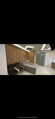 a room with a couch and chairs and a table at HP Studio Luxury Apartment in Athens