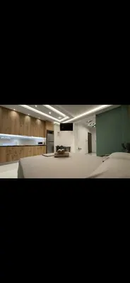 a view of a room with a bed and a desk at HP Studio Luxury Apartment in Athens