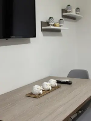 a table with four cups on top of it at Kris boy in Athens