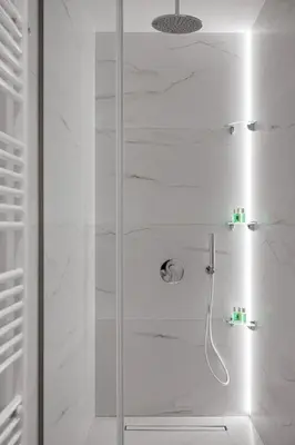 a shower with a glass door in a bathroom at Acropolis Sherlock Residence in Athens