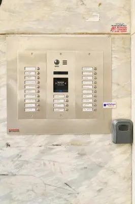 a beige wall with a machine on a marble floor at Marina's Luxurious Apartment in Athens, Centre in Athens
