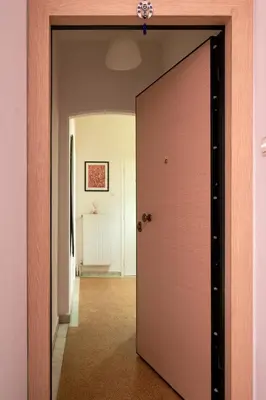 a door leading into a room with a hallway at Marina's Luxurious Apartment in Athens, Centre in Athens