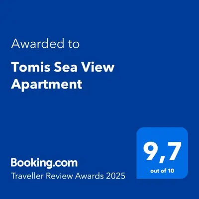 a blue screen with the text awarded to tomkins sea view appointment at Tomis Sea View Apartment in Piraeus