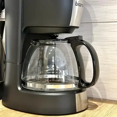 a black coffee maker sitting on a counter at Dafni City Apartment 3 in Athens