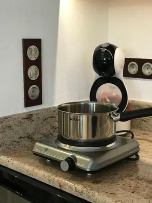 a pot sitting on top of a kitchen counter at NATURE & SEA in Saronida
