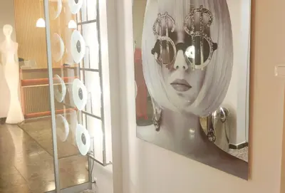 a picture of a woman with a head on a wall at Mirada Hotel in Athens