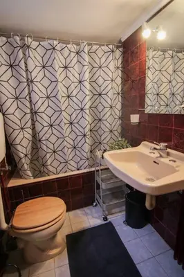 a bathroom with a toilet and a sink at Πολυτελές διαμέρισμα-Πασαλιμάνι in Piraeus