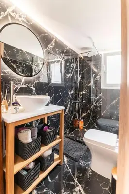 a bathroom with a sink and a toilet at Under the Hill in Athens