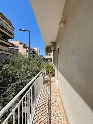 a balcony of a building with a white railing at Athens Classic Luxury 2-Bedroom Apartment in Athens